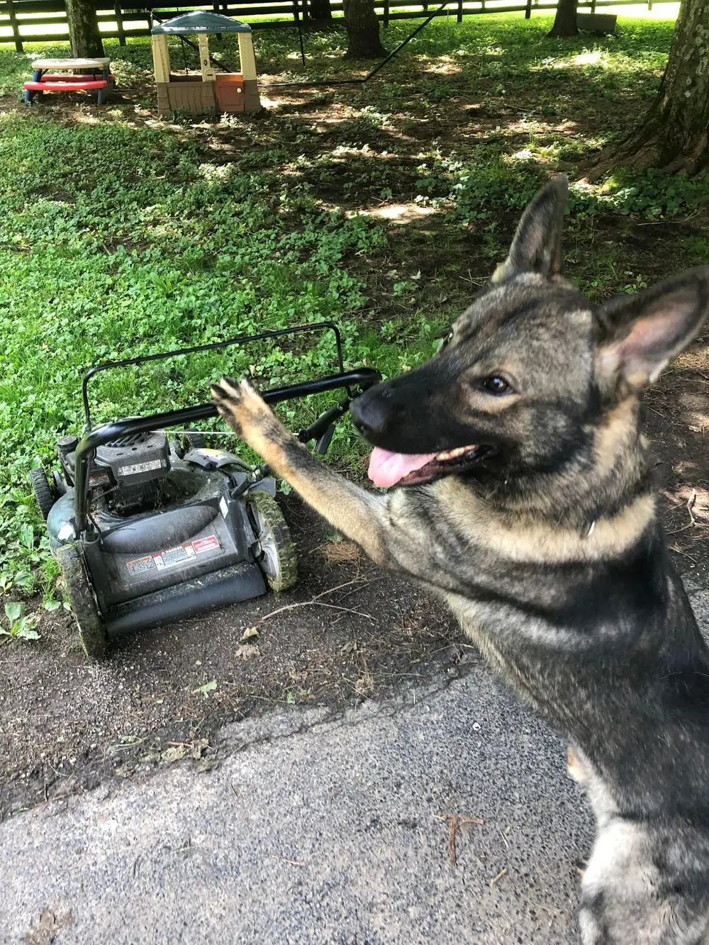 Holding place beside a running mower